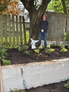 Completed garden!  We even had enough perennials to plant an additional garden strip along the walkway.  Volunteers from St. Isaac Jogue’s Boy Scout Troop #124 and their families and friends, under the planning, solicitation of donations, and leadership of Benjamin Bell enabled the completion of the project in spring 2026.