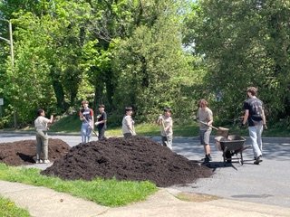The "Big Dig”.  Removal of overgrown shrubs, roots, weeds, poison ivy and vines was completed through the assistance of volunteers from YMGC Members, their spouses, Boy Scout Troop #124 and their parents, and the facility’s owner.
